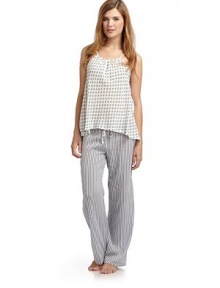 THE LOOKDotted and stripe printsAdjustable spaghetti strapsPants have drawstring waistTHE FITTop: about 22 from shoulder to hemPants: rise, about 8; inseam, about 29THE MATERIALCottonCARE & ORIGINMachine washImportedModel shown is 5'10 (177cm) wearing US size Small. THE LOOKDotted and stripe printsAdjustable spaghetti strapsPants have drawstring waistTHE FITTop: about 22 from shoulder to hemPants: rise, about 8; inseam, about 29THE MATERIALCottonCARE & ORIGINMachine washImportedModel shown is 5'10 (177cm) wearing US size Small.