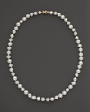 Gleaming freshwater pearls in a classic strand, finished with a yellow gold clasp.