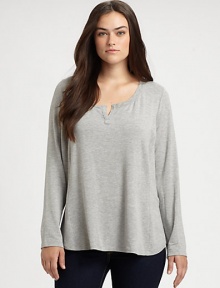 Inspired by athletic style, but with a decidedly feminine shape, a jersey top with intriguing seams. It will pair exquisitely with skinny jeans.Split neckLong sleevesPull-on styleCurved hemAbout 26 from shoulder to hemModal/spandexMachine washMade in USA Inspired by athletic style, but with a decidedly feminine shape, a jersey top with intriguing seams. It will pair exquisitely with skinny jeans.Split neckLong sleevesPull-on styleCurved hemAbout 26 from shoulder to hemModal/spandexMachine washMade in USA