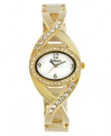 Light up the room with this unique bangle watch by Style&co. Gold tone mixed metal bangle bracelet with crystal-accented crossed links and oval case. White dial features gold tone numerals at twelve, three, six and nine o'clock, three hands and logo. Quartz movement. Two-year limited warranty. Light up the room with this unique bangle watch by Style&co. Gold tone mixed metal bangle bracelet with crystal-accented crossed links and oval case. White dial features gold tone numerals at twelve, three, six and nine o'clock, three hands and logo. Quartz movement. Two-year limited warranty.