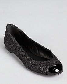 Sparkling with every step, these cap toe Giuseppe Zanotti flats lend a not-so-subtle shimmer. Sparkling with every step, these cap toe Giuseppe Zanotti flats lend a not-so-subtle shimmer.