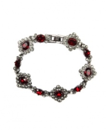 Regal bearing. Add a rich, resplendent finishing touch to your fall wardrobe with this elegant flex bracelet from Givenchy. Crafted in hematite tone mixed metal, it's embellished with red and black glass accents. Approximate length: 7-1/4 inches. Regal bearing. Add a rich, resplendent finishing touch to your fall wardrobe with this elegant flex bracelet from Givenchy. Crafted in hematite tone mixed metal, it's embellished with red and black glass accents. Approximate length: 7-1/4 inches.