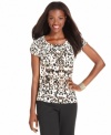 A fun animal-print makes this petite top stand out from the crowd! Pair with pants, jeans, skirts and more!