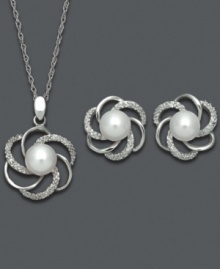The perfect set of matching pinwheels. A cut-out spiral setting adorns this intricate jewelry set. Cultured freshwater pearls (6-7 mm) and diamond accents add shimmer and shine. Set in sterling silver. Approximate length: 18 inches. Approximate pendant drop: 7/8 inch. Approximate earrings drop: 1/2 inch.