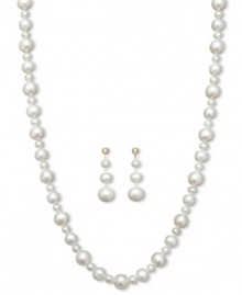 Add ultimate sophistication to your look. This stunning jewelry set features a matching pearl strand necklace and drop earrings with large and small cultured freshwater pearls (4-10 mm). Set in 14k gold. Approximate length: 18 inches. Approximate drop: 1-1/2 inches. Add ultimate sophistication to your look. This stunning jewelry set features a matching pearl strand necklace and drop earrings with large and small cultured freshwater pearls (4-10 mm). Set in 14k gold. Approximate length: 18 inches. Approximate drop: 1-1/2 inches.