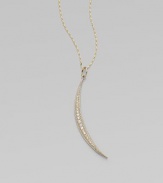 A slender slip of a crescent moon, long and lyrical, sparkles with diamonds and dangles from a gold barley chain.Diamonds, .17 tcw14k yellow gold and sterling silverChain length, about 18Pendant length, about 2Spring ring claspMade in USA
