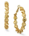 Twist the night away in these fun hoops from Alfani! Earrings feature a twisted design with a golden shine. Crafted in gold tone mixed metal. Approximate diameter: 2 inches.