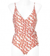 Add instant chic to your swim-ready style with this adorable swimsuit from Diane von Furstenberg - V-neck, wrap style with side tie detail, thin straps, deep V in back, full-coverage bottom, all-over floral print - Pair with a sheer caftan, wedge heels, and a floppy sun hat