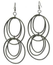 Ring in sophisticated style with GUESS. These multi-hoop earrings are crafted in hematite tone mixed metal with textured detail. Approximate drop: 4 inches. Approximate diameter: 1-3/4 inches. Ring in sophisticated style with GUESS. These multi-hoop earrings are crafted in hematite tone mixed metal with textured detail. Approximate drop: 4 inches. Approximate diameter: 1-3/4 inches.