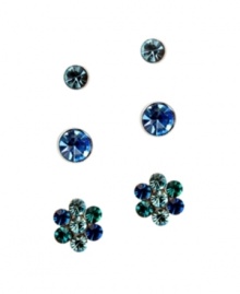 Sparkling style to match any ensemble. GUESS's fashionable three earring stud set features two round-cut studs and one pair of flower studs. Set crafted in silver tone mixed metal highlighting blue and blue zircon crystals. Approximate diameters: 7 mm, 5 mm, and 3-1/2 mm. Sparkling style to match any ensemble. GUESS's fashionable three earring stud set features two round-cut studs and one pair of flower studs. Set crafted in silver tone mixed metal highlighting blue and blue zircon crystals. Approximate diameters: 7 mm, 5 mm, and 3-1/2 mm.