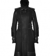 Streamlined in exquisitely soft Toscana shearling, Belstaffs Kettering coat is an ultra luxurious investment piece guaranteed to amp up your outfit - Belted shearling collar with removable wind guard, long sleeves, belted cuffs, leather epaulettes, hidden front zip and push-snap closures, double belted waist detail at sides, allover black leather trim, cozy fur interior - Tailored fit - Wear with jet black leather accessories for an edgy urban finish