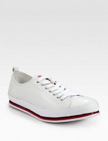 A sporty design with a clean, modern finish, rendered in smooth Italian leather.Leather upperLeather liningPadded insoleRubber soleMade in Italy A sporty design with a clean, modern finish, rendered in smooth Italian leather.Leather upperLeather liningPadded insoleRubber soleMade in Italy