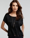 The tee gets a luxe upgrade from Michael Stars. Team with dark denim and a silver pendant for effortless chic.