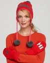 Feel like a princess in this cute knit ski hat with an intarsia crown and pom-pon embellished braid ties.