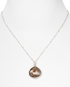 With a faceted smoky quartz pendant, Coralia Leets' 22-karat gold necklace is elegance simplified. Day or after dark, this piece slips on to give a spectrum of looks tonal sparkle.