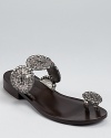 With both western and bohemian influences, these Jack Rogers sandals show off shimmering metallic leather and a versatile look.