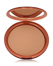 Give yourself a heavenly glow with this silky, luxurious powder bronzer. Unique oil-control complex keeps skin shine-free and comfortable. Smooth, oil-free powder is perfect for giving face, shoulders and decolletage a healthy bronze look. Sweep on all over to enhance existing color or to create the look of a fabulous tan. Give yourself a heavenly glow with this silky, luxurious powder bronzer. Unique oil-control complex keeps skin shine-free and comfortable. Smooth, oil-free powder is perfect for giving face, shoulders and decolletage a healthy bronze look. Sweep on all over to enhance existing color or to create the look of a fabulous tan.