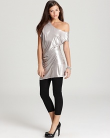 Layer this GUESS metallic tunic over sleek leggings for a casual take on after-dark glamour. Layer this GUESS metallic tunic over sleek leggings for a casual take on after-dark glamour.