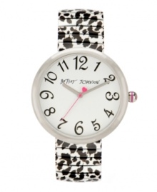 On the prowl. Dress for the game with this watch by Betsey Johnson. Black and white snow leopard print stainless steel expansion bracelet and round stainless steel case. White dial features black numerals, silver tone hour and minute hands, signature fuchsia second hand with heart and logo. Quartz movement. Water resistant to 30 meters. Two-year limited warranty.