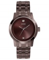 Diamond accents stand out on this polished steel watch from GUESS.