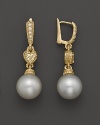 Freshwater pearl drop earrings with heart-shaped canary crystal and pave diamond accents. By Judith Ripka.