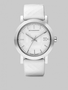 A timepiece with a check imprinted patent leather strap and check etched dial. Quartz movement Water resistant to 5 ATM Round stainless steel case, 38mm (1.5) Smooth bezel White check etched dial Bar hour markers Date display at 3 o'clock Second hand White check imprinted patent leather strap, 20mm wide (0.78) Made in Switzerland A timepiece with a check imprinted patent leather strap and check etched dial. Quartz movement Water resistant to 5 ATM Round stainless steel case, 38mm (1.5) Smooth bezel White check etched dial Bar hour markers Date display at 3 o'clock Second hand White check imprinted patent leather strap, 20mm wide (0.78) Made in Switzerland