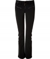 Make a chic statement on the slopes in Jet Sets ultra modern stretch ski pants, finished with a flattering cut guaranteed to show off your sporty side in style - Zip fly, zippered front pockets, adjustable belt in front, straight leg with silver star circle print, flared zippered ankles, partially lined legs from the hemline to thigh, elasticized band at the thigh with silicon for hold - Fitted through the knee - Wear with figure-hugging turtlenecks and cozy shearling lined boots