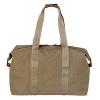 For easy and on-the-go outings, this duffel is waterproof treatment with leather trim. Carrying case included.