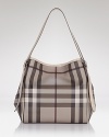 This modern tote in Burberry's iconic check makes a chic statement work or weekend.