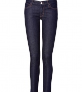 Sexy cropped skinny jeans in classic dark denim with orange contrast stitching - Traditional five-pocket design with button closure and zip fly - Long, fitted leg falls at ankle - Perfect choice for day or evening - Dress up with heels and a lace top, or dress down with ankle boots and an off-shoulder sweater
