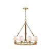 Elegantly rendered in luxurious saddle leather and brass, this modern Ralph Lauren chandelier illuminates through eight bulbs topped with textural linen shades.