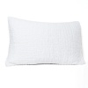 Effortless elegance. An intricate stitch in a crisp white distinguishes this luxurious Donna Karan quilted sham.