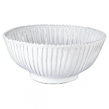 Handmade and inspired by the maestro artisan's family heirloom dinnerware, this generously sized serving bowl makes a rustically sophisticated dining statement. Handmade and inspired by the maestro artisan's family heirloom dinnerware, this generously sized serving bowl makes a rustically sophisticated dining statement.