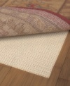 Extend the life of your rug with the Sure Grip Rug Pad. Designed to keep your rug in place, the rug pad prevents floor scratches and can be used on any hard surface. Consistent thickness throughout its construction makes for a smooth, wrinkle-free area rug that's easy to vacuum. Simply cut the pad with scissors to fit the exact shape and size of your rug!