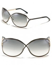 Tom Ford's chic oversized cross frames with openings at temple for a modern style. Tom Ford's chic oversized cross frames with openings at temple for a modern style.