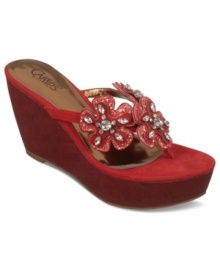 Brighten your day with intricate sparkle. Carlos by Carlos Santana's Thebes wedge thong sandals feature amazing eye-catching flower accents along the vamp. Brighten your day with intricate sparkle. Carlos by Carlos Santana's Thebes wedge thong sandals feature amazing eye-catching flower accents along the vamp.