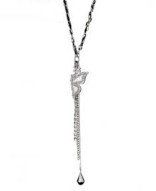 Get breezy, California style in GUESS's chic butterfly pendant. Y-shaped necklace features a glittering butterfly with Mother of Pearl and crystal-accented wings. Setting and chain drop crafted in silver tone mixed metal with sparkling crystal accents and black woven ribbon. Approximate length: 16 inches + 2-inch extender. Approximate drop: 3 inches. Get breezy, California style in GUESS's chic butterfly pendant. Y-shaped necklace features a glittering butterfly with Mother of Pearl and crystal-accented wings. Setting and chain drop crafted in silver tone mixed metal with sparkling crystal accents and black woven ribbon. Approximate length: 16 inches + 2-inch extender. Approximate drop: 3 inches.