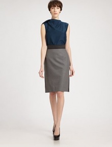 Luxurious silk/wool crepe, tailored in a chic, sleeveless silhouette accented with a soft, modern shoulder drape.High neckline with draped back panelSleevelessAbout 23 from shoulder to hem61% silk/39% woolDry cleanMade in FranceModel shown is 5'10 (177cm) wearing US size 4. Luxurious silk/wool crepe, tailored in a chic, sleeveless silhouette accented with a soft, modern shoulder drape.High neckline with draped back panelSleevelessAbout 23 from shoulder to hem61% silk/39% woolDry cleanMade in FranceModel shown is 5'10 (177cm) wearing US size 4.