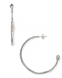 Melinda Maria's silver-plated hoops are a jewel box staple. Whether dressed down or to the nines, these versatile crystal-detailed earrings are designed to add instant glamour. Melinda Maria's silver-plated hoops are a jewel box staple. Whether dressed down or to the nines, these versatile crystal-detailed earrings are designed to add instant glamour.