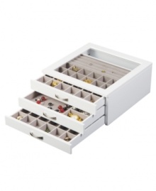 Keep track of your treasure in the Liza jewelry box. Three slide-out trays with divided sections and a glass lid that offers a peek of what's inside make it indispensable for staying organized. With nickeltone pulls and a fresh white finish. Keep track of your treasure in the Liza jewelry box. Three slide-out trays with divided sections and a glass lid that offers a peek of what's inside make it indispensable for staying organized. With nickeltone pulls and a fresh white finish.