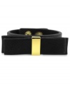 BCBGeneration makes a subtle, but bold statement with this snap bracelet. With details crafted from gold-tone mixed metal, the bracelet features a bow on top for a fashionable touch. Approximate length: 8 inches.