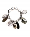 Marvel in the effortless beauty of metallics. Easy to match with any ensemble, Nine West's eye-catching stretch bracelet highlights plastic jet beads, silver tone mixed metal beads and hematite tone mixed metal discs. Approximate diameter: 2-1/4 inches.