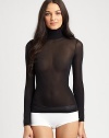 Wear this seductively sheer design on its own or under a blazer for a fresh, modern update. TurtleneckLong sleevesSheer with a hint of sheen92% polyamide/8% elastaneMachine wash or hand washMade in Austria