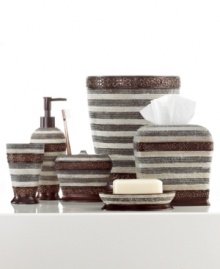 A mix of modern and classic, this Cordonette tissue holder features a brushed oil finish with elegant scroll details and sparkling beaded accents for a sophisticated look in the bathroom. A mix of modern and classic, this Cordonette tissue holder features a brushed oil finish with elegant scroll details and sparkling beaded accents for a sophisticated look in the bathroom.