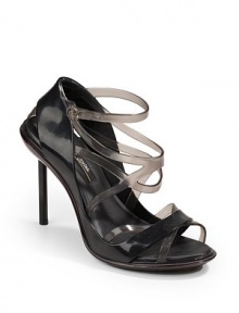 THE LOOKA collaboration with Jean Paul GaultierMelflex plastic upperCrisscross top strapsAdjustable ankle strapPadded insoleMelflex plastic heel, 4¼ (110mm)THE MATERIALMelflex plastic upperMelflex lining and soleORIGINMade in BrazilOUR FIT MODEL RECOMMENDS ordering true whole size; ½ sizes should order the next whole size down. 
