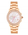 Show off your heart of rosy gold with this Betsey Johnson watch. Polished rose-gold tone stainless steel bracelet and round case. Bezel embellished with crystal accents. White mother-of-pearl chronograph dial features rose-gold tone dot markers, Roman numerals, three subdials, heart at four o'clock, rose-gold tone hour and minute hands, signature fuchsia second hand and logo. Quartz movement. Water resistant to 30 meters. Two-year limited warranty.