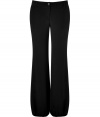 These classic wide leg pants feature an elasticized cuff for a cool, cutting-edge flowing silhouette -Zip with button closure, belt loops, relaxed silhouette, elasticized cuffs - Style with a fitted blouse, a bold shoulder blazer, and platform pumps