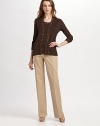 This classically tailored silhouette is rendered in soft stretch cotton for a more fitted, feminine look. Hook-and-bar tab and button closure Zip front Waist darts Inseam, 33 96% cotton/4% wlastane Dry clean Imported 