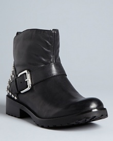GUESS puts a saucy spin on the moto bootie in this abbreviated design, with a single buckle and studded back to polish up the look. GUESS puts a saucy spin on the moto bootie in this abbreviated design, with a single buckle and studded back to polish up the look.