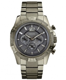 Be bold, be beautiful. This rugged gunmetal sports watch from GUESS keeps you going with a stopwatch and 24-hour international time. Be bold, be beautiful. This rugged gunmetal sports watch from GUESS keeps you going with a stopwatch and 24-hour international time.